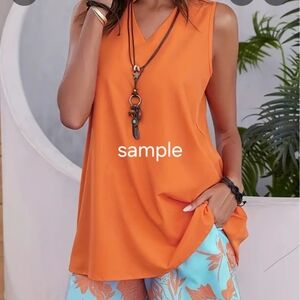 Orange Shirt paired with Floral Print High-Waisted Short Set